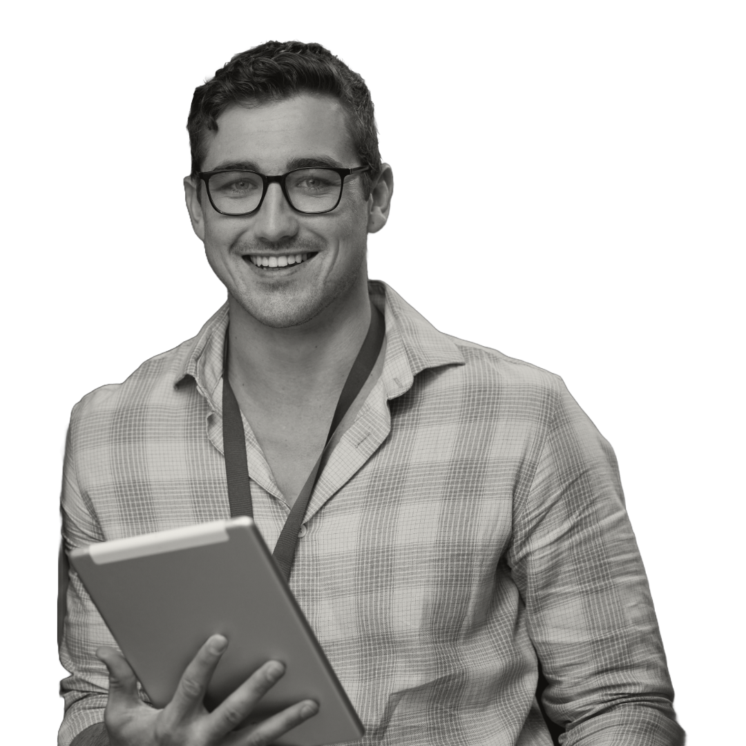A seasoned cybersecurity professional from CIT stands assuredly with a tablet, showcasing cutting-edge technology at work, symbolizing CIT's commitment to proactive digital defense strategies for businesses.